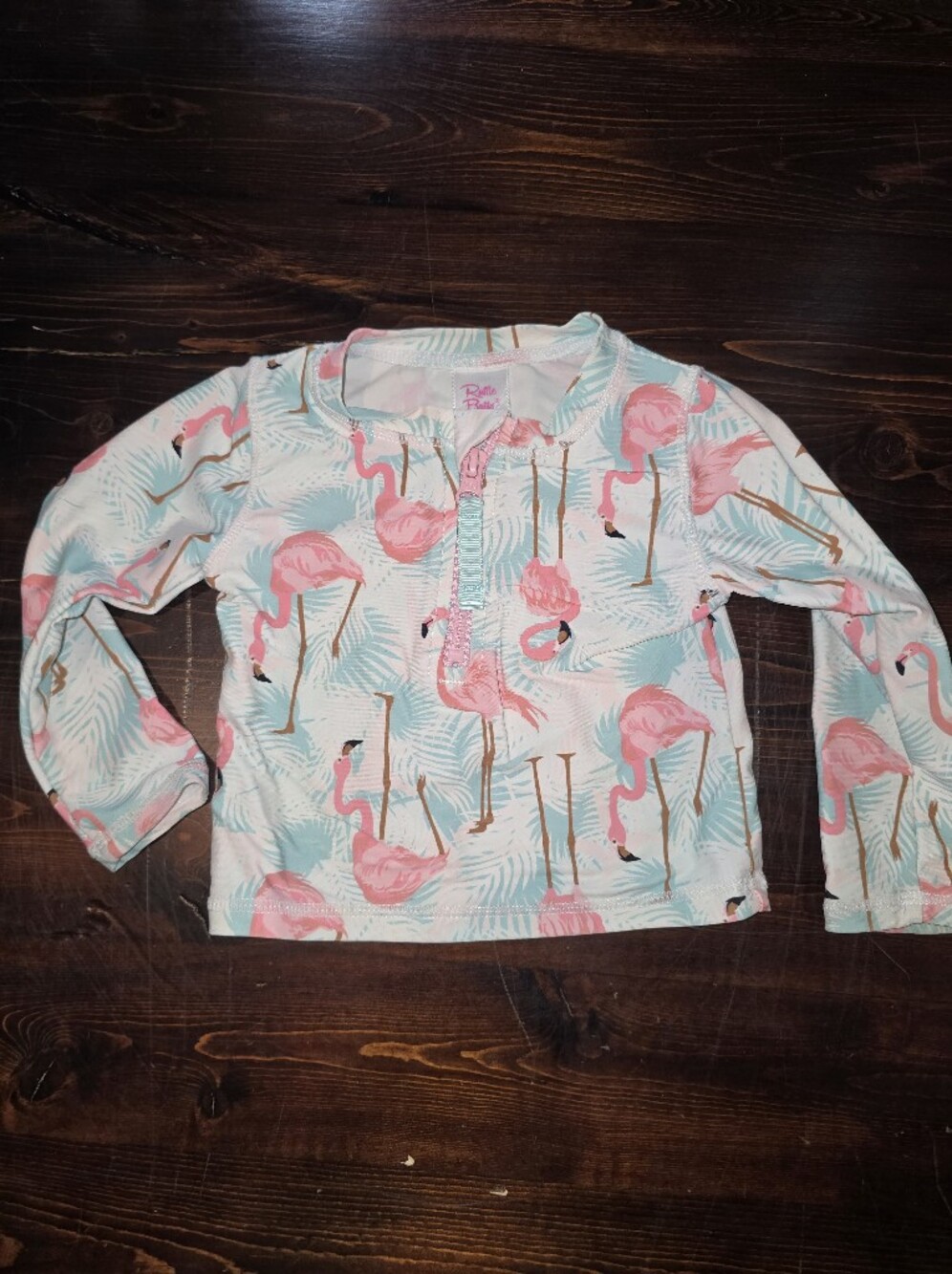RuffleButts Baby/Toddler Girls Pink Flamingo Palm Long Sleeve Swim Rash Guard